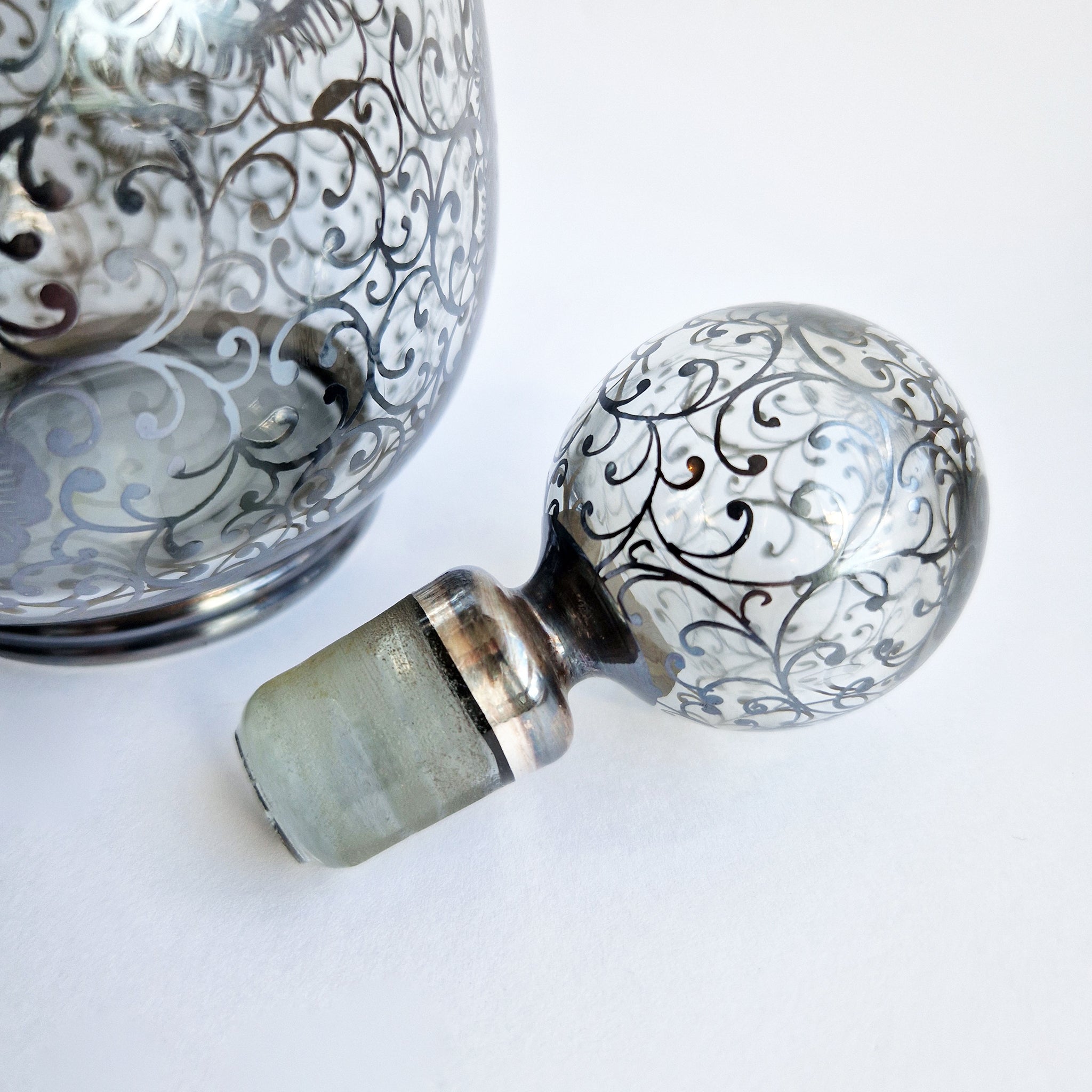 Vintage Venetian bottle with silver overlay