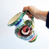 Vintage Italian maiolica jug with braided handle