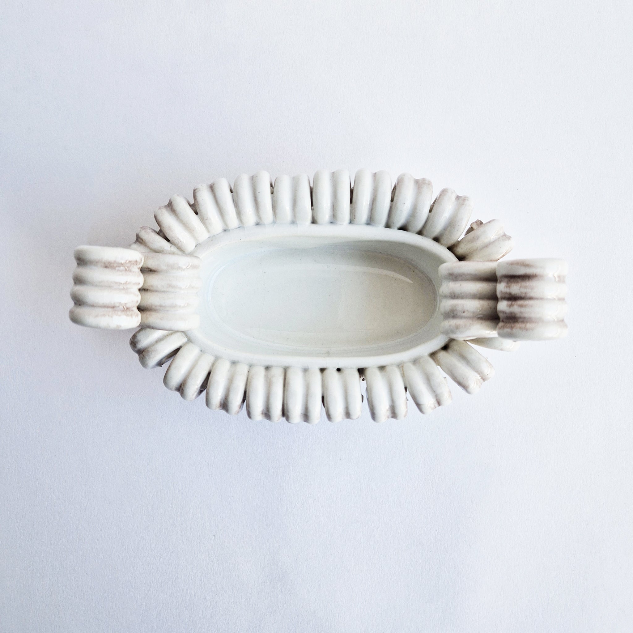 Vintage Italian trinket dish with scrolls