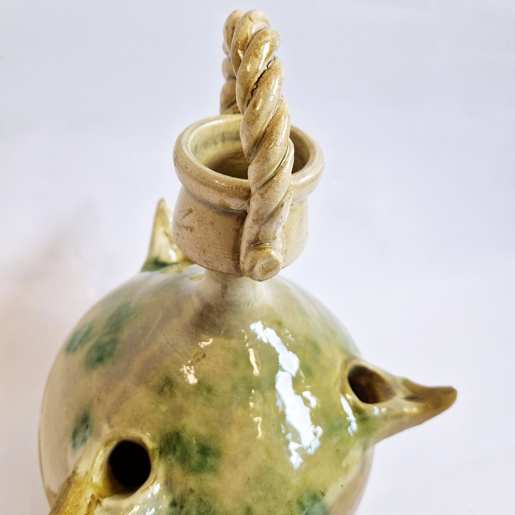 Vintage amphora with three spouts