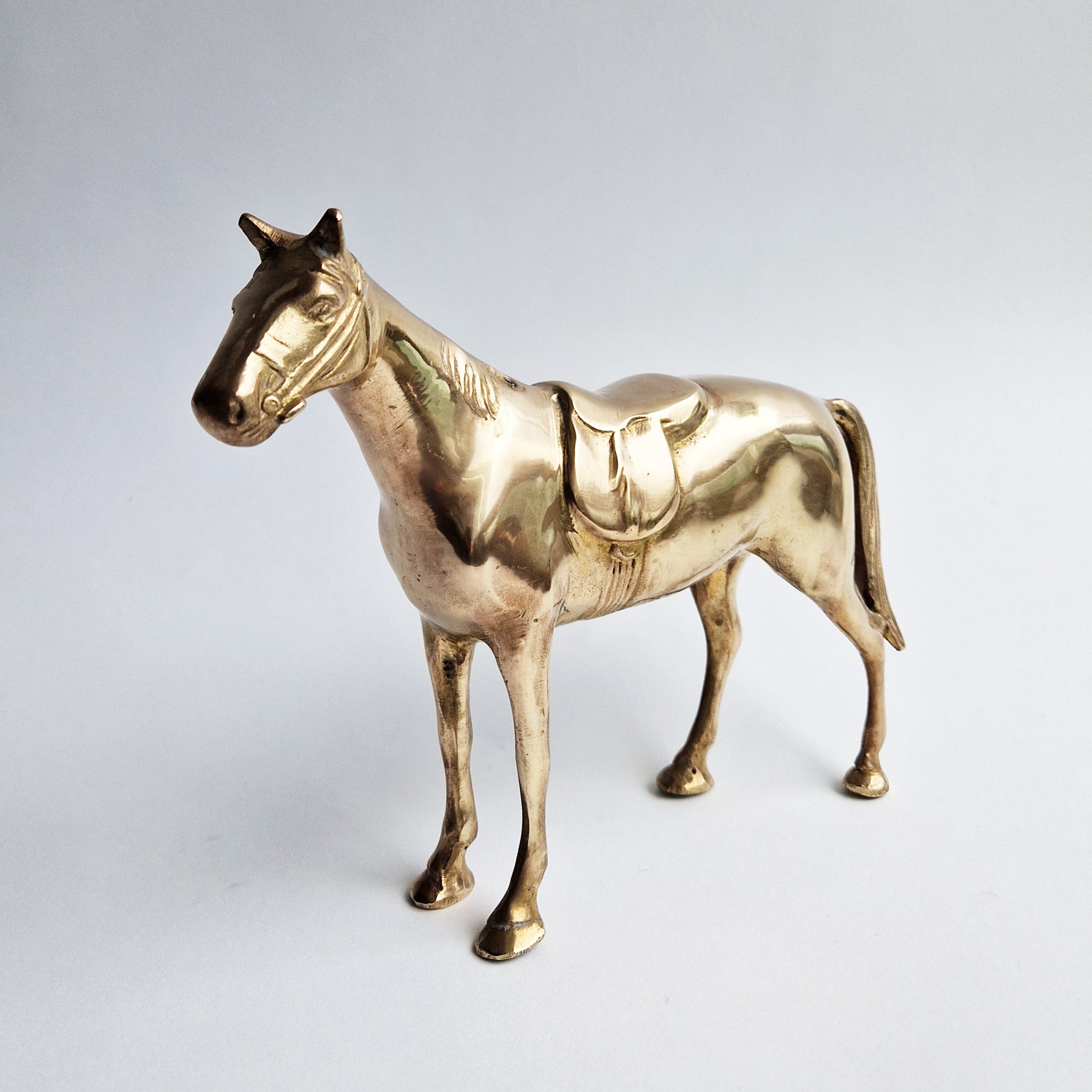 Vintage brass horse statue