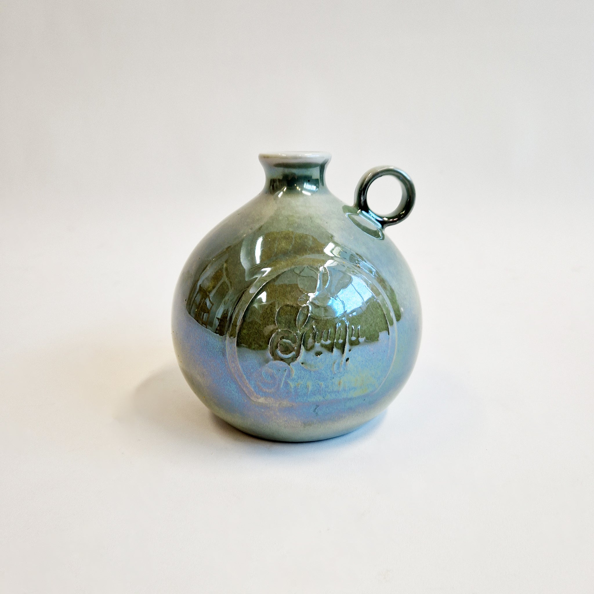 Vintage ceramic Grappa bottle