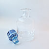 Vintage crystal decanter with blue stopper