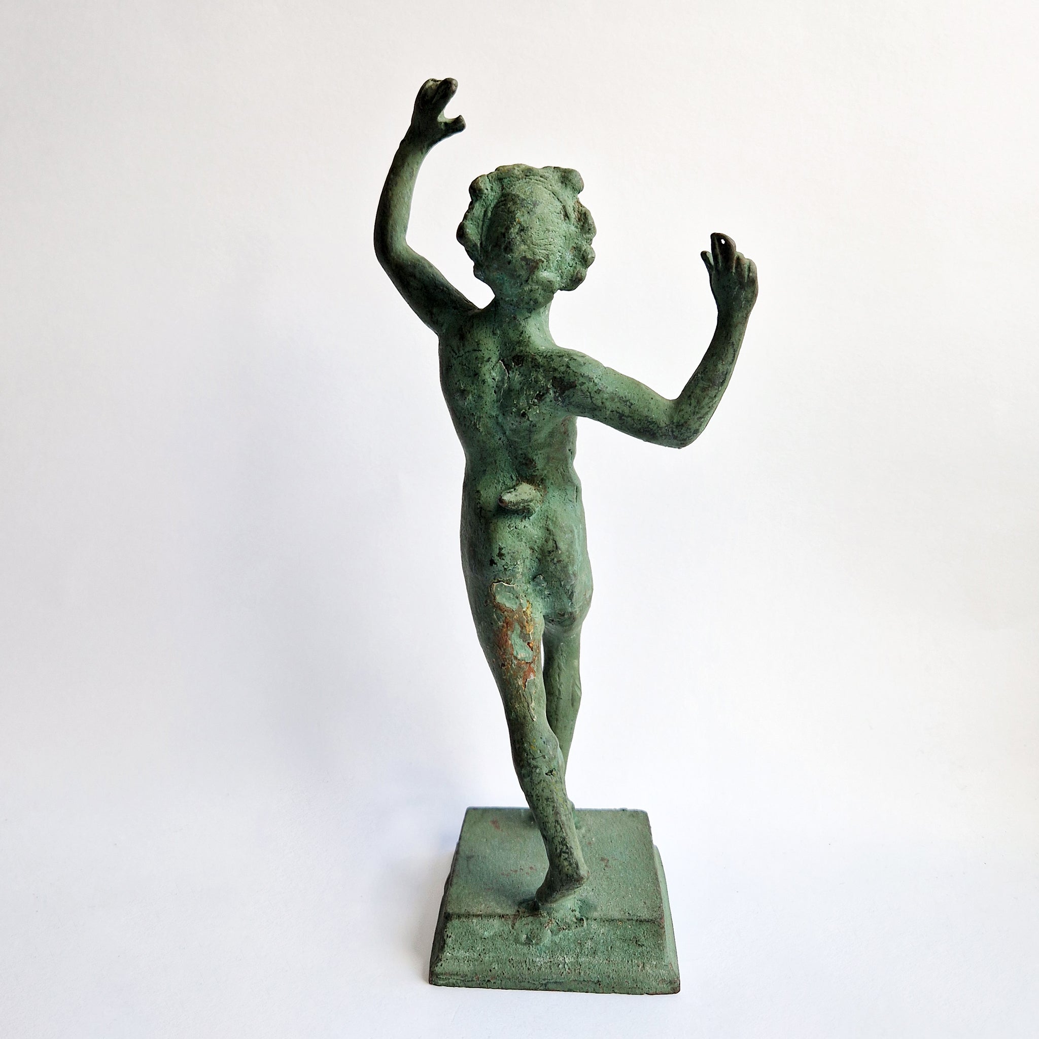 Vintage dancing faun of Pompeii statue
