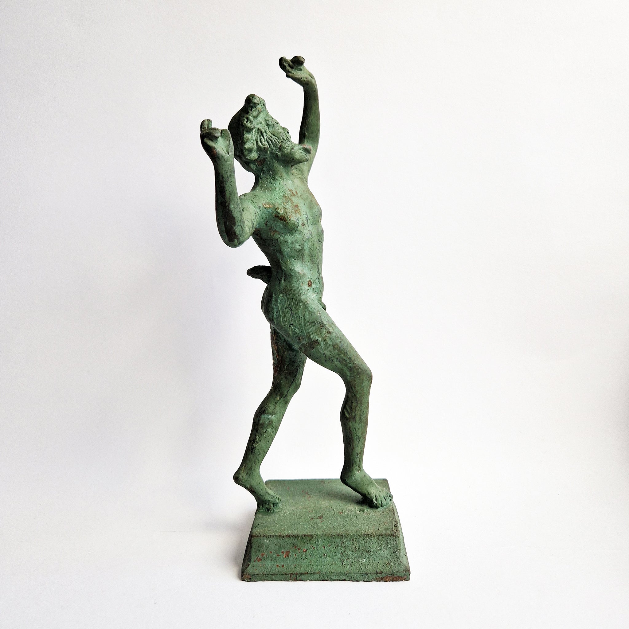Vintage dancing faun of Pompeii statue