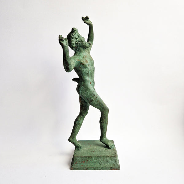 Vintage dancing faun of Pompeii statue