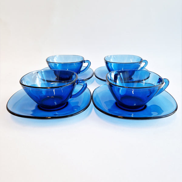 Vintage blue glass cups and saucers