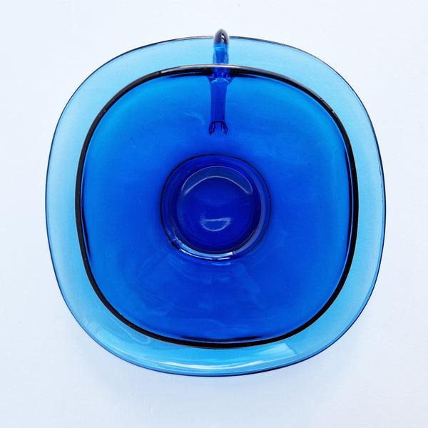 Vintage blue glass cups and saucers