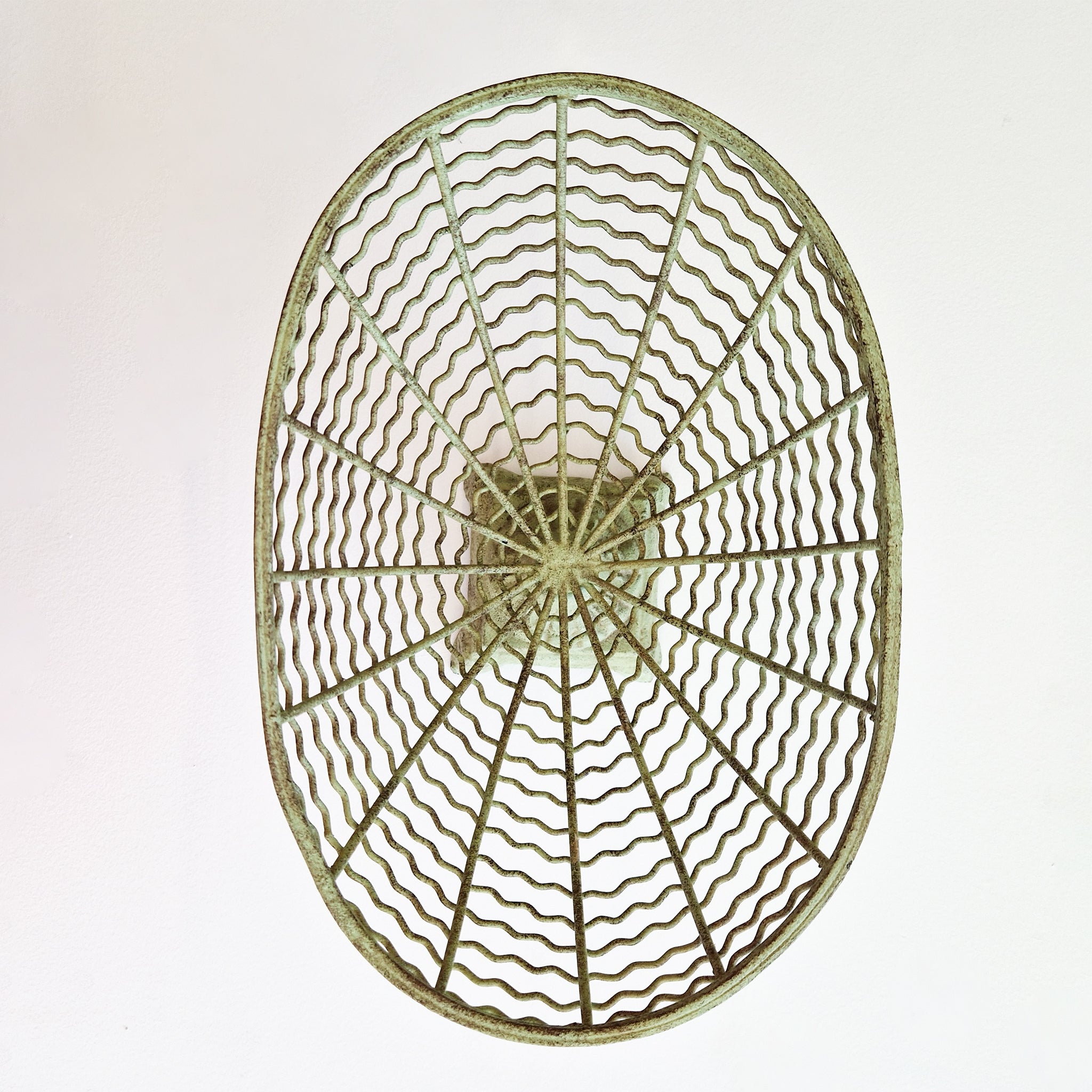 Vintage iron fruit basket on pedestal