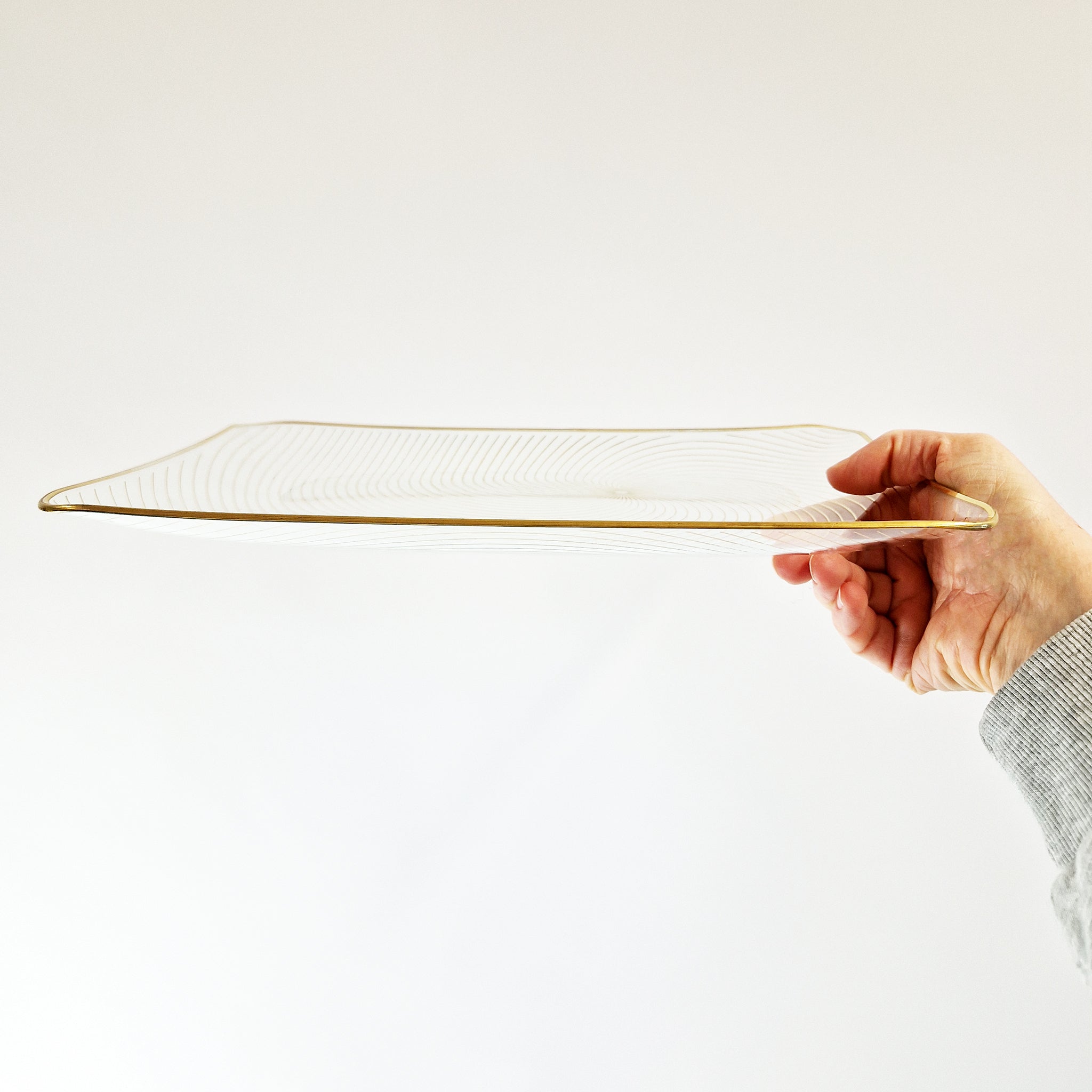 Vintage large glass tray with swirly pattern