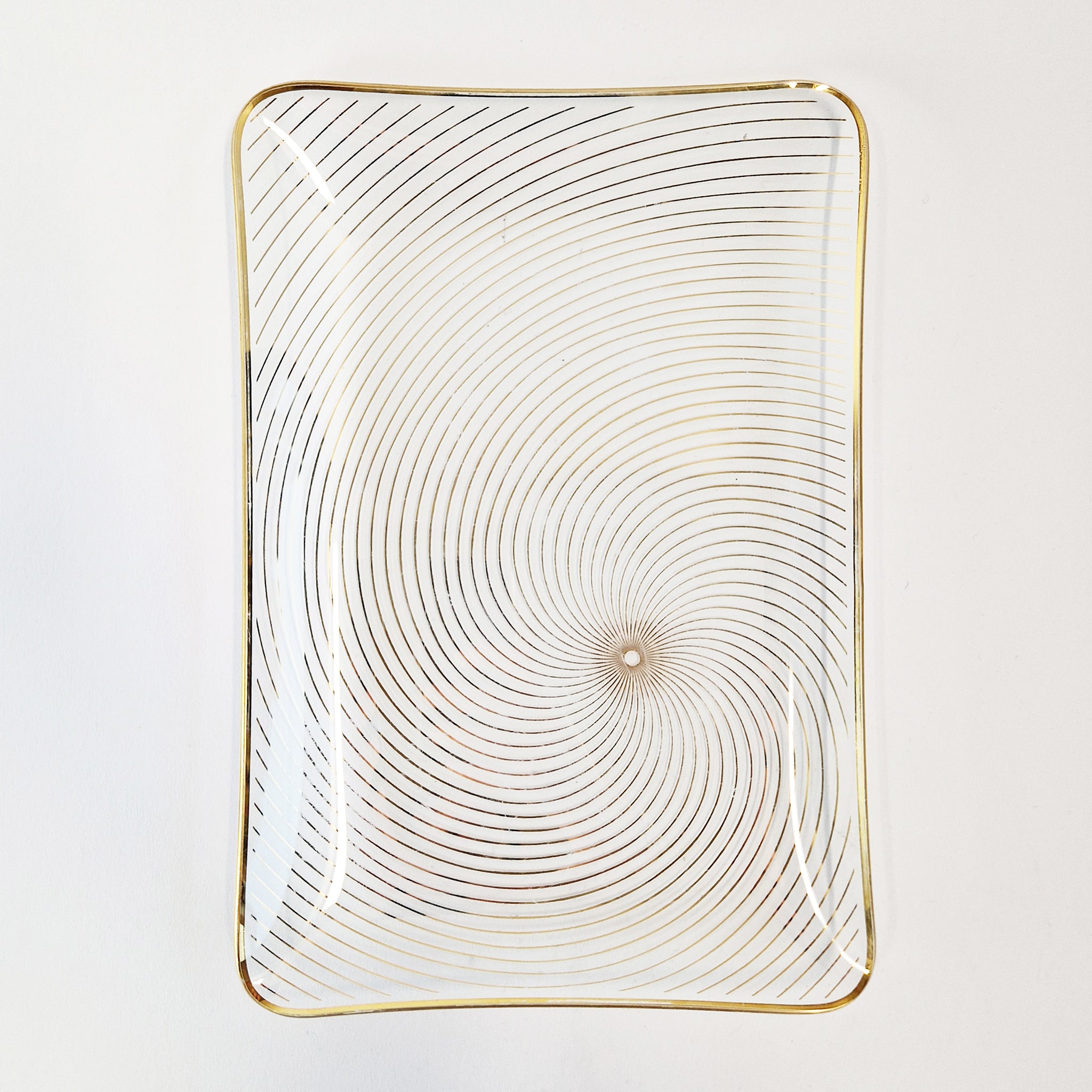 Vintage large glass tray with swirly pattern