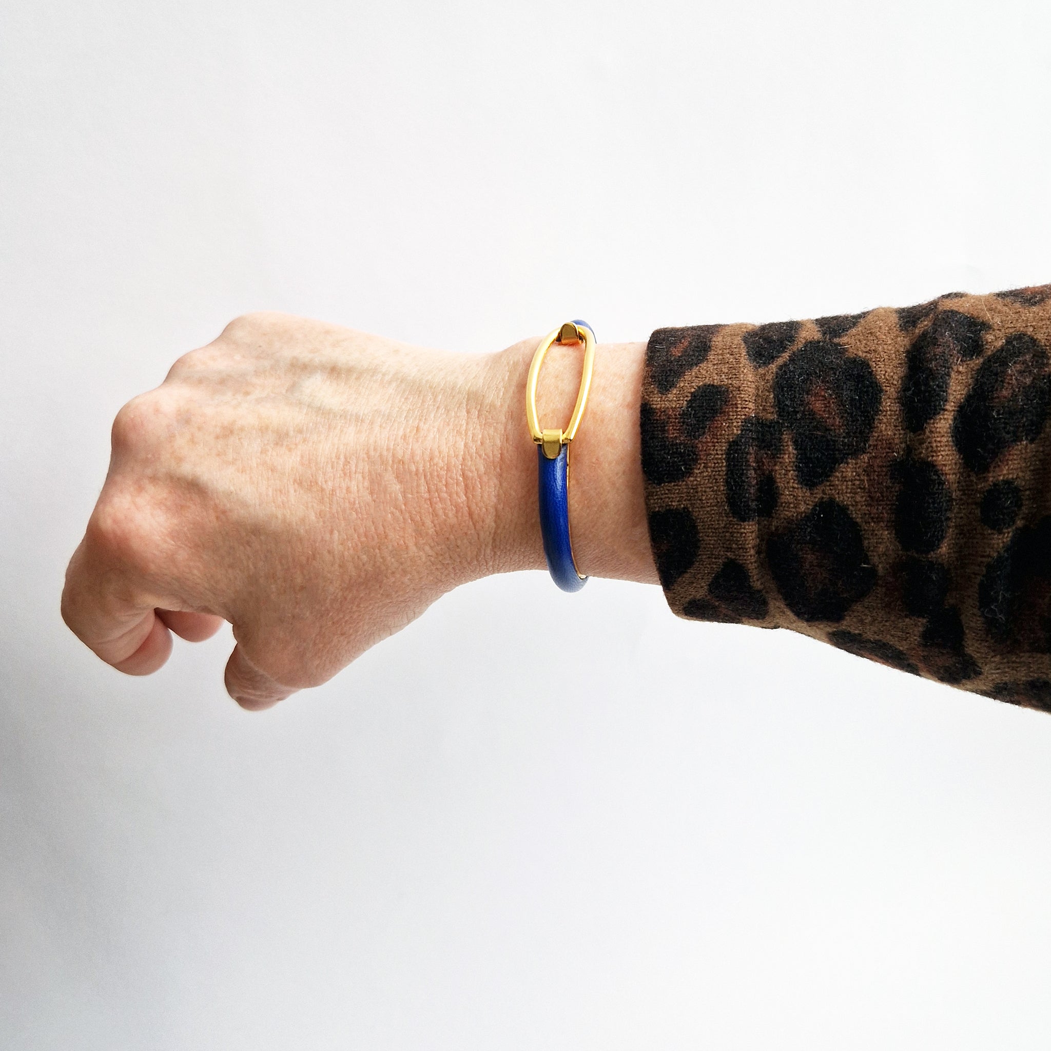 Pre-loved leather and gold bracelet by Mannelli