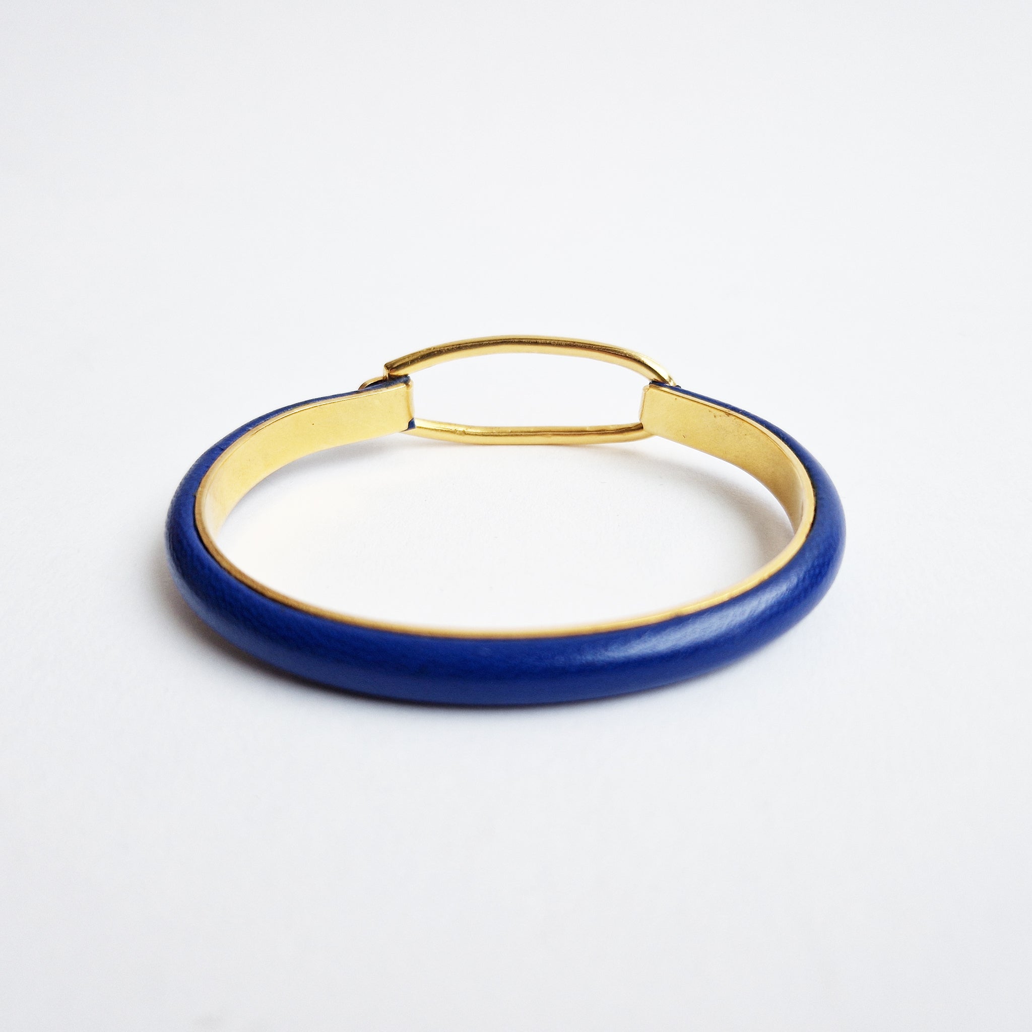 Pre-loved leather and gold bracelet by Mannelli