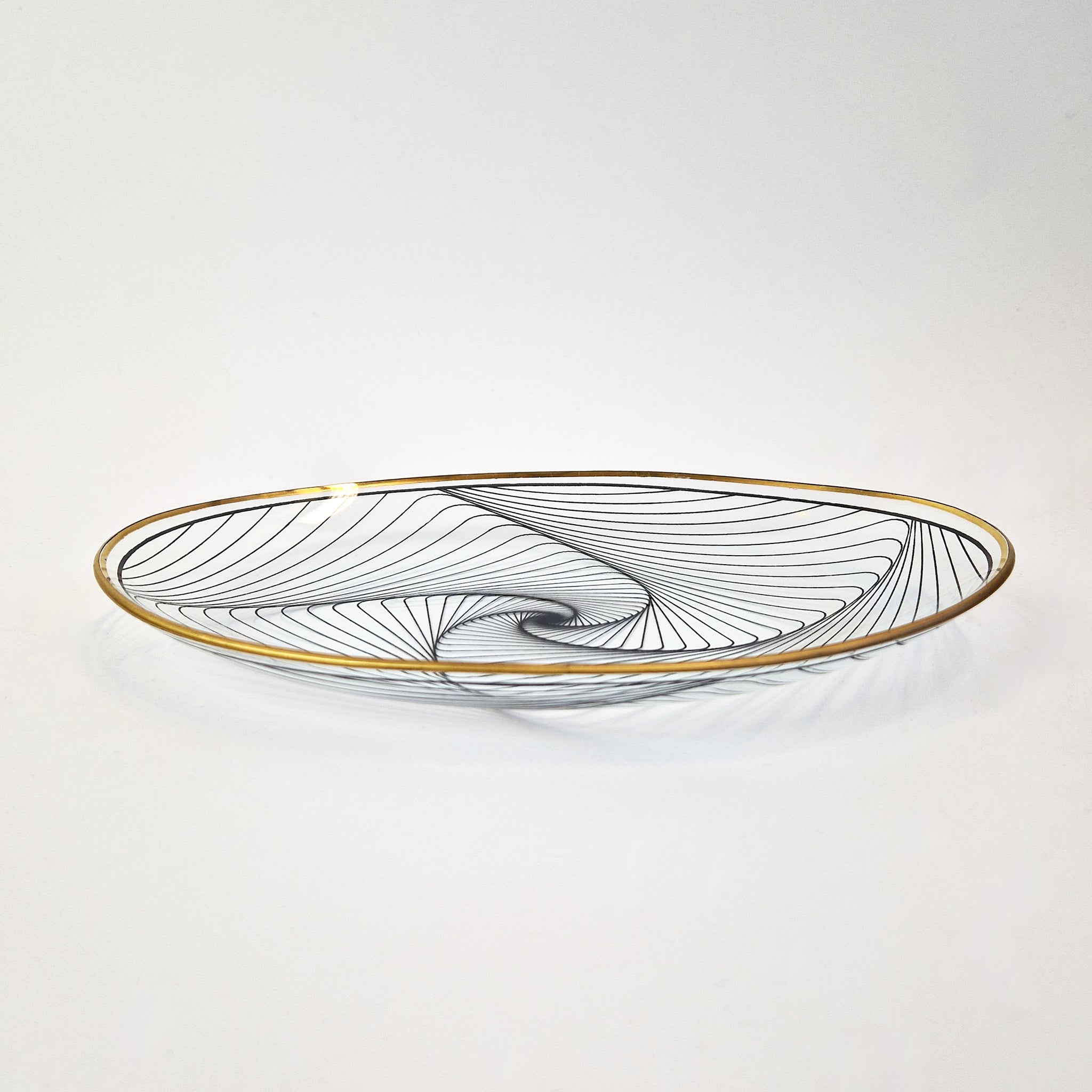 Vintage oval glass dish with swirly pattern