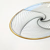 Vintage oval glass dish with swirly pattern