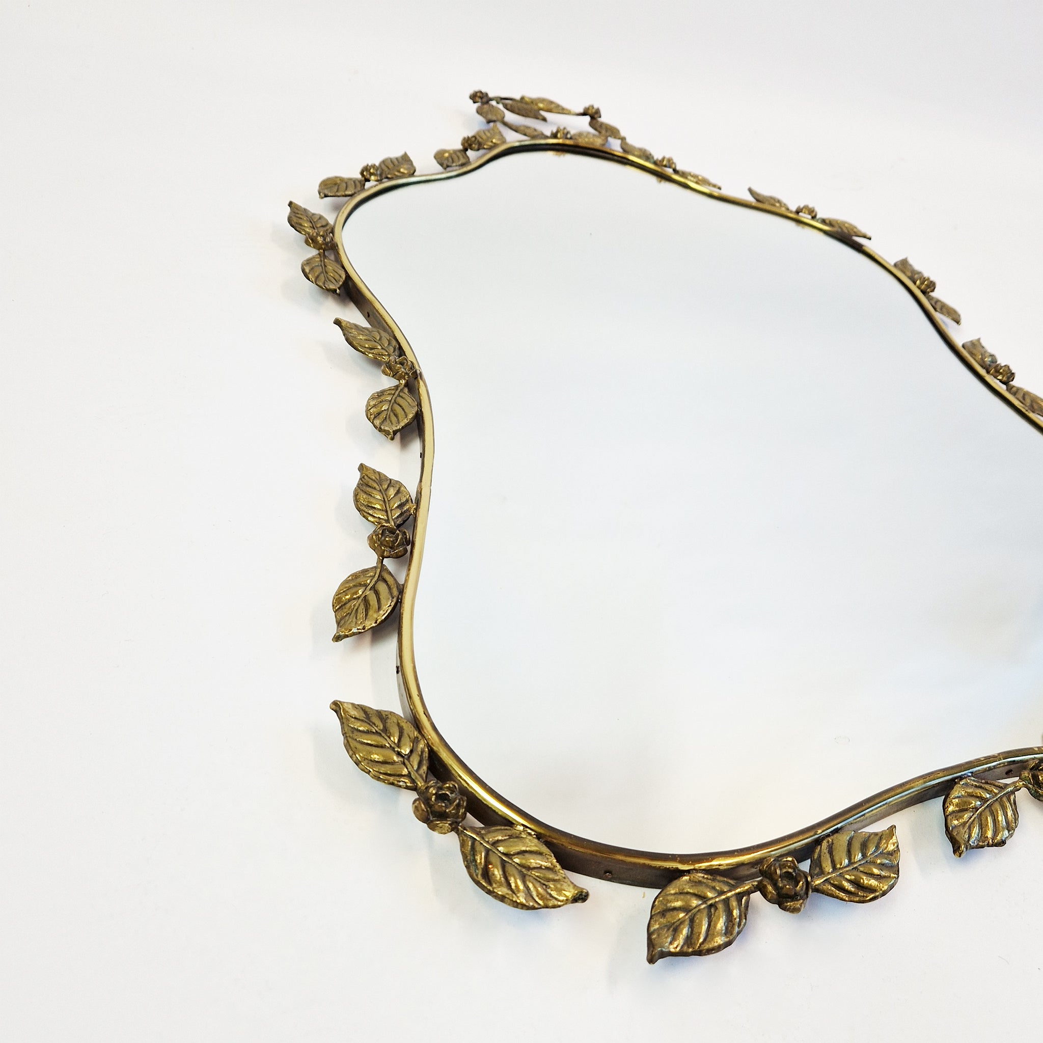 1950s Italian brass mirror with floral design