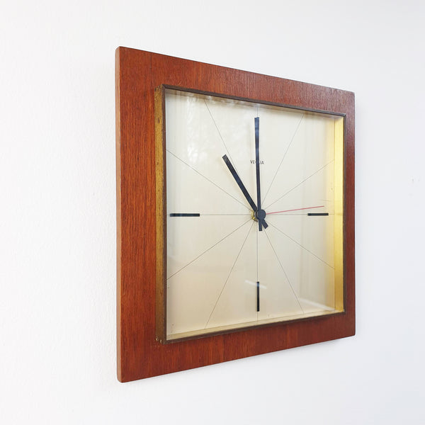 1960s wood and brass wall clock by Veglia