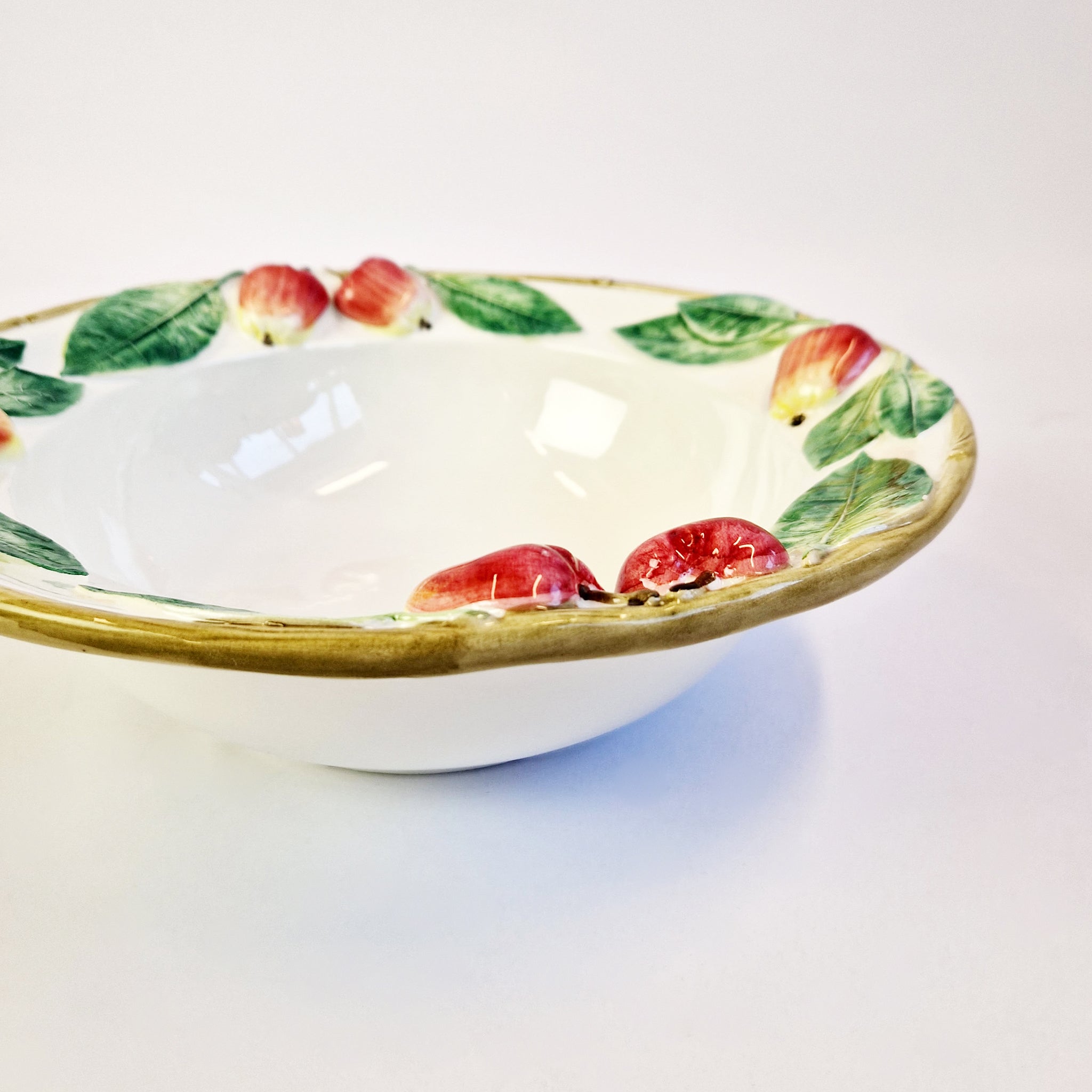 Large Italian ceramic bowl with apples