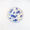 Mid-century plate with blue hand-painted decoration