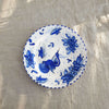 Mid-century plate with blue hand-painted decoration