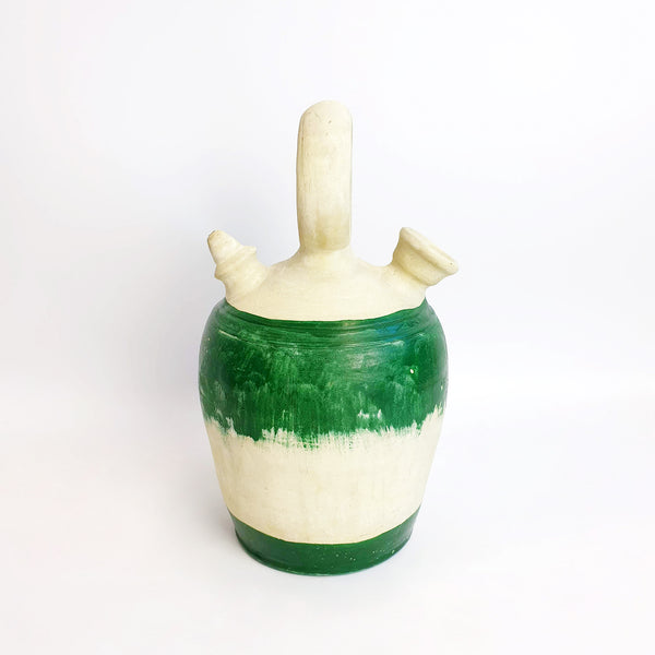 Vintage earthenware jug with green decor