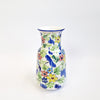 Vintage terracotta vase with flowers